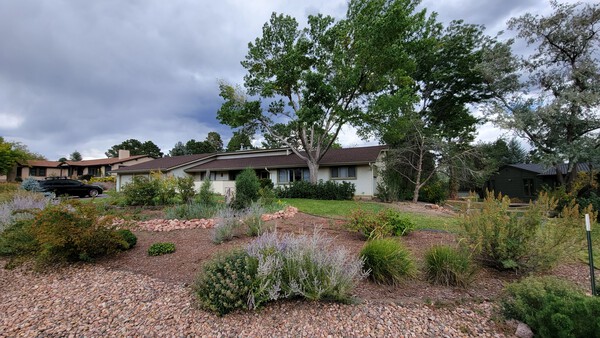 Before: The low-slung home was nondescript, with the low roof line making it difficult for the interior to enjoy any expansive views.