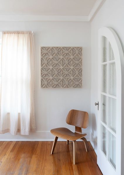 Diade No. 5 features an open design that incorporates petal-shaped forms framed in a style reminiscent of midcentury modern breeze blocks.