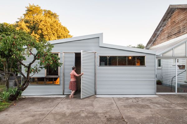 Jane McDougall and David Beynon of alsoCAN architects transformed their 600-square-foot backyard shed into a self-contained guests suite with a kitchenette, bedroom, and wheelchair-accessible bathroom.
