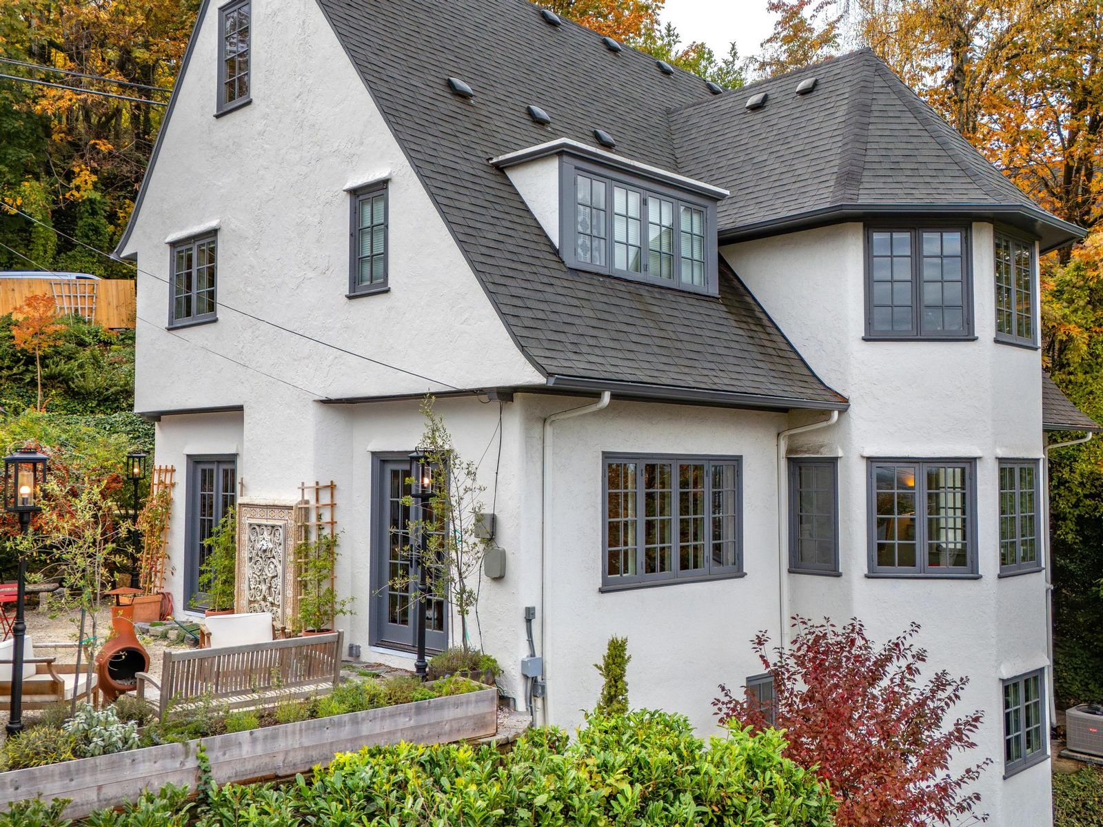 Set high in the hills above Portland, this home has a stately turret, vibrant interiors, and 200-year-old terra-cotta tile floors.