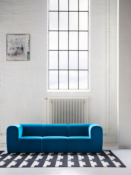 Available in dark turquoise, dark brown, beige and gray/white, this sofa can be configured into many sizes depending on which sections you purchase.