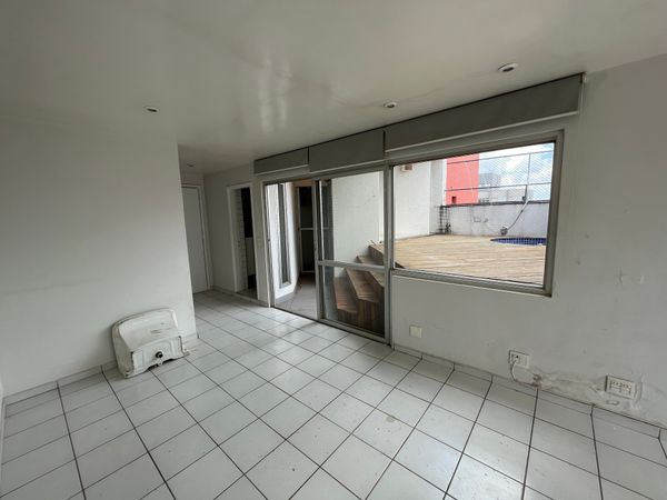 before-there-was-previously-a-powder-room-and-laundry-room-to-the-side-of-the-entry-with-angled-walls-jutting-into-the-outdoor-terrace-which-was-occupied-by-an-elevated-deck.jpg
