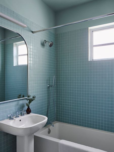 "For all rooms, the client and our team were dedicated to the idea of color immersion, especially in small spaces like the bathrooms and hallways,