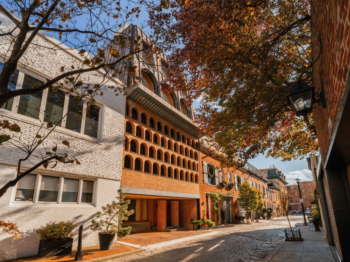 over-the-course-of-50-years-frank-weise-turned-a-carriage-house-into-a-residence-and-studio-defined-by-intricate-brickwork-and-a-dramatic-mansard-roof.jpg