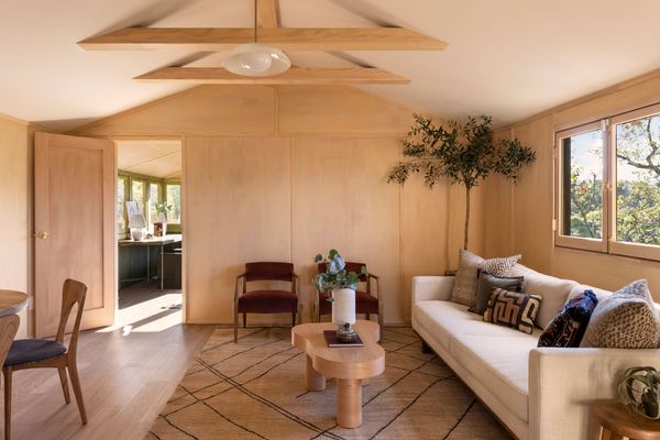 paul-landacre-was-famous-for-his-woodcarving-the-house-makes-creative-use-of-the-material-as-well-honoring-its-original-design-with-hand-built-wooden-windows-and-custom-milled-redwood-siding.jpg