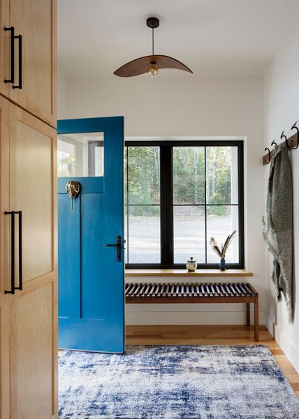 The entryway features a wide window, which were all sourced from KBS Builders. The total, including glazing, cost $62,370.