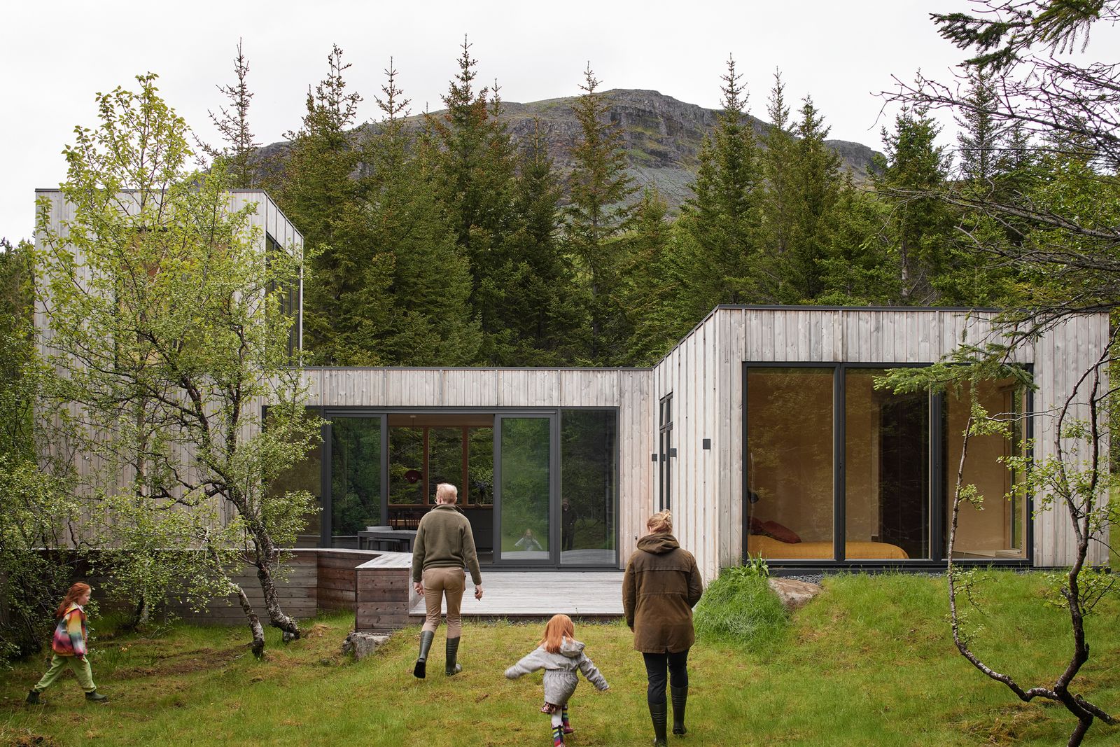 The exterior of the home is clad in Norway spruce. All of the windows are from Velfac, with the sliders from Schuco.