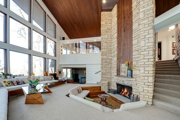 The living room features a well-loved staple of mid-century design: a conversation pit.
