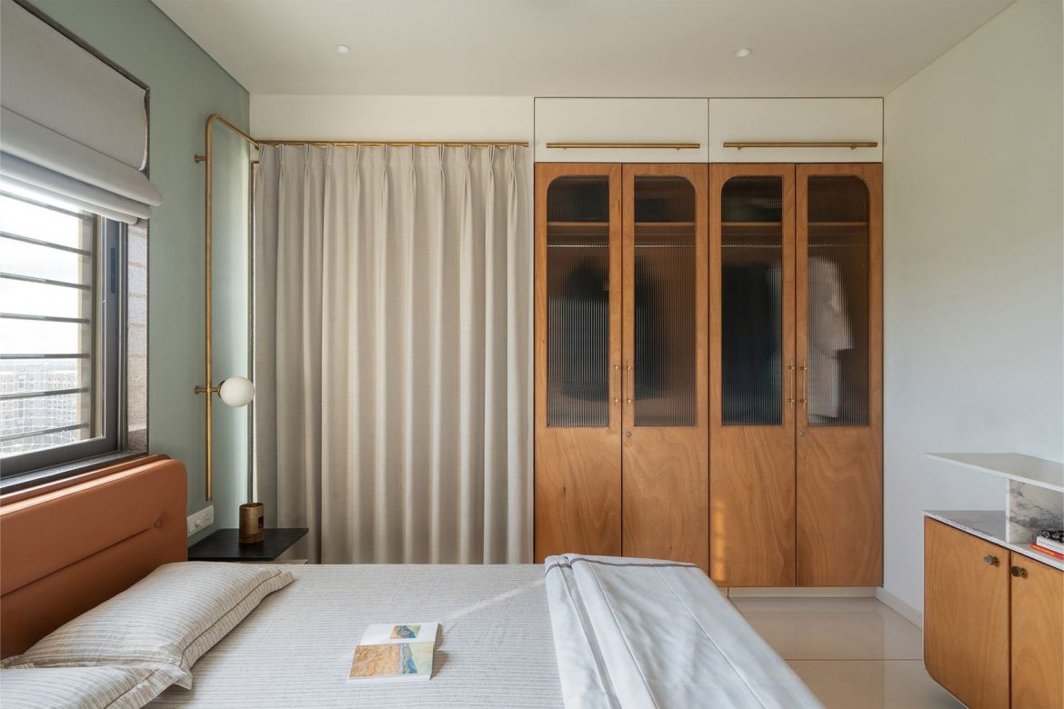 the-master-bedroom-incudes-closet-doors-and-a-floating-shelf-cupboard-combo-clad-with-polished-plywood.jpg