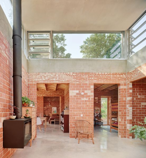 Located in Matadepera, Spain, this 1,539-square-foot house for a family of four is composed of nine modules for a flexible yet private living space.