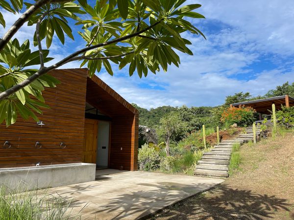 Solar-powered with a backup generator, the home is off the electrical grid.